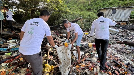 Clean Hub Press image: Men collecting plastic waste in nature